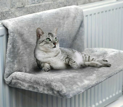 Ant radiatoriaus pakabinamas hamakas katėms